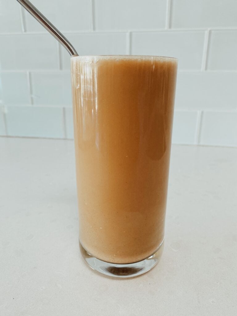 iced coffee with creamer in a glass