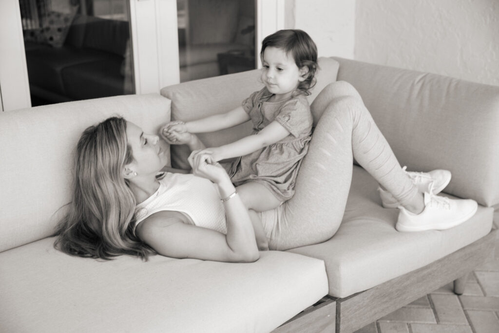 mother and daughter on couch